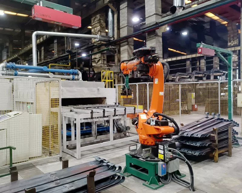 Heat treatment line loading of leaf springs